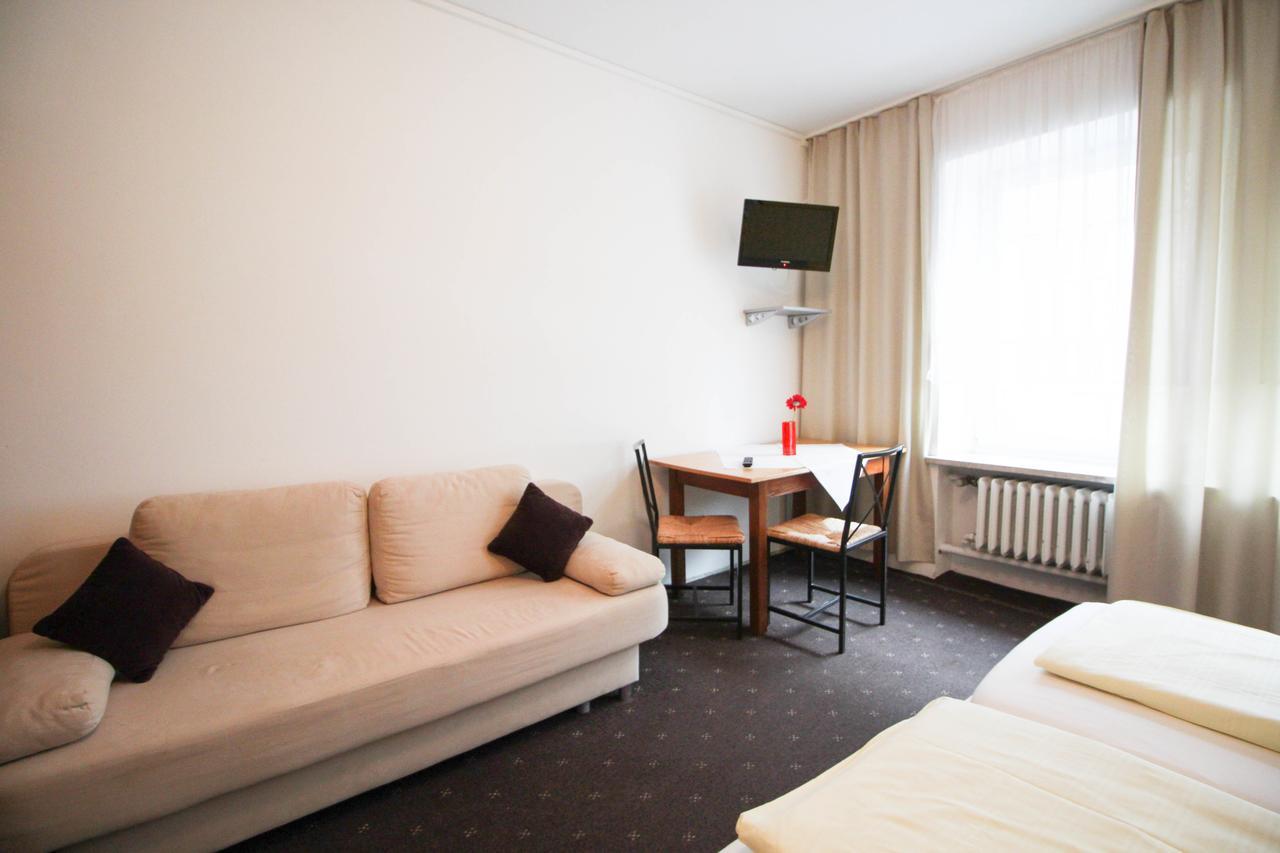 Hotel Pension Am Hauptbahnhof Munique Quarto foto